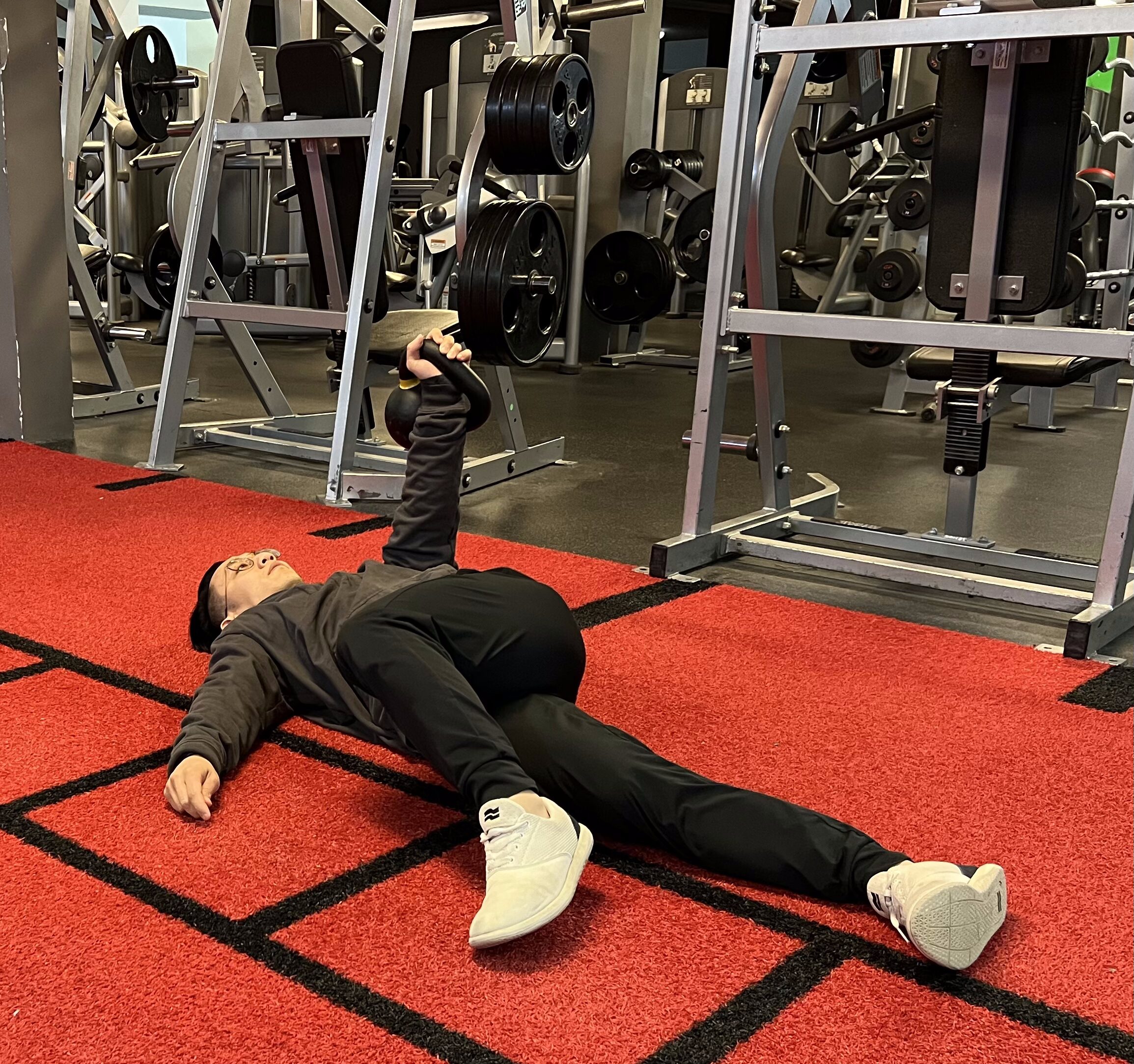 Person doing a kettlebell armbar